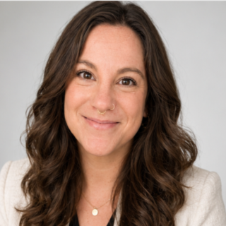 A headshot of Residential Scholarship Housing Specialist Jenn Schoolcraft